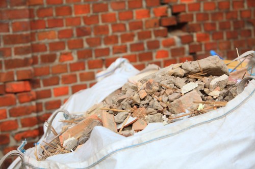 Customer service representative assisting with skip hire