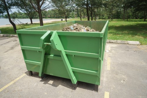 Team delivering a commercial skip to a Canary Wharf site